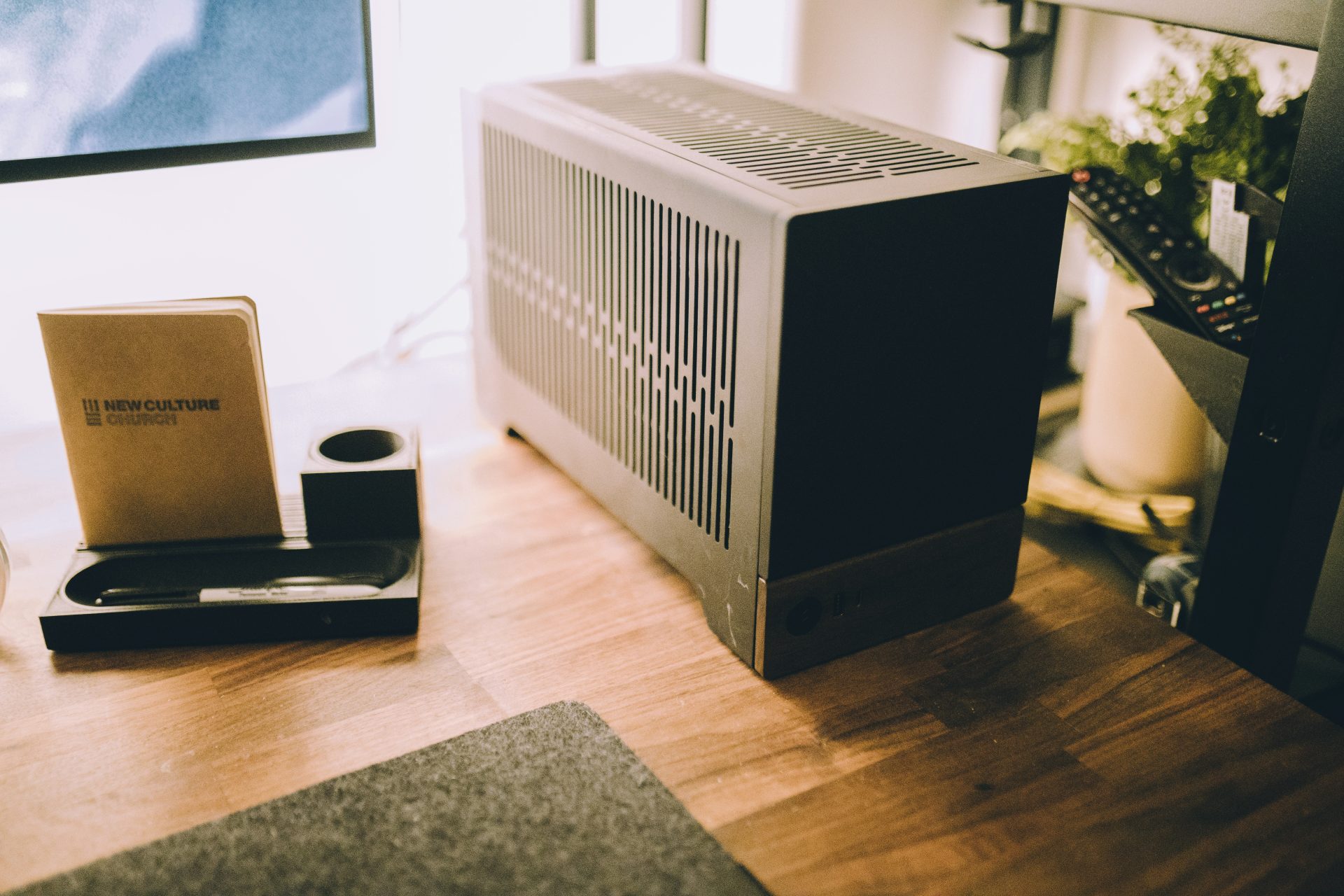 a desktop computer sitting on top of a wooden desk